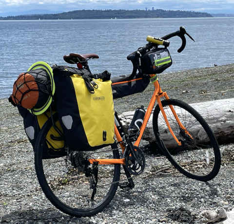 Photo of a bicycle on a beach.